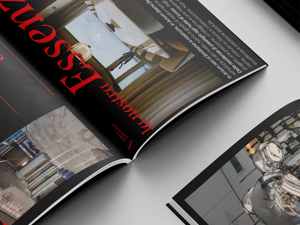 Dettaglio della brochure corporate Arium con impaginazione editoriale dedicata a interni, progetti e realizzazioni di edilizia di alto livello.