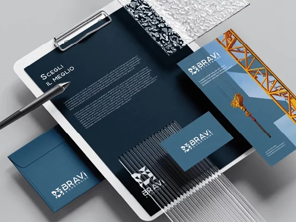 Coordinato aziendale Bravi a Costruire con carta intestata, buste, biglietti da visita e materiali grafici della nuova brand identity.