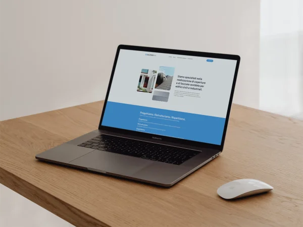 Mockup del sito web Colombo HUB su laptop, con presentazione dei servizi dedicati a coperture e facciate ventilate per edifici civili e industriali.